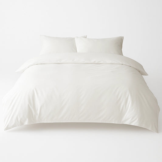 Full PLA-Pima Cotton four-piece bedding set on bed, showing luxurious, skin-friendly, anti-mite, and breathable eco bedding.