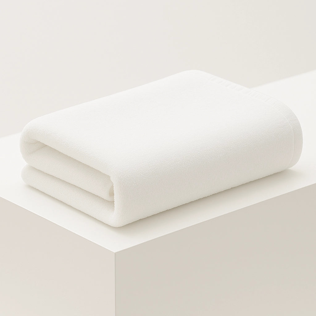 White eco-friendly PLA-cotton towel designed for enhanced softness and odor resistance.