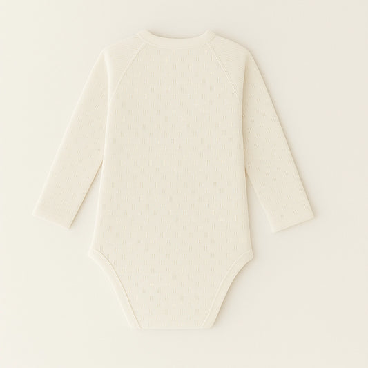 Back view of Sincdoo beige PLA baby romper, breathable and sustainable babywear option.